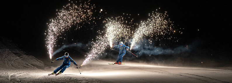 Skishow Skifahrer auf der Piste