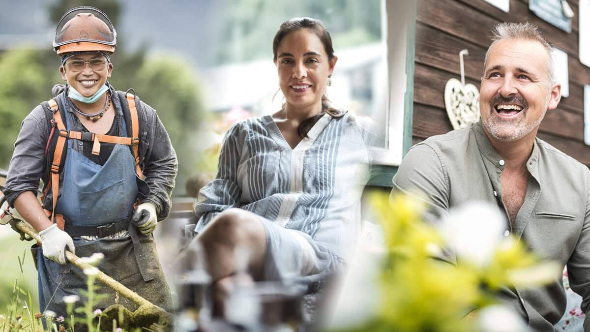 A man wearing protective clothing and a helmet is working with a brush cutter in a flowering meadow. He smiles at the camera. A woman sits relaxed on a brown leather sofa in a bright room with a view of green mountains. A smiling man stands in a lush vegetable garden with a mountain backdrop. He is wearing an olive green shirt and points to the vegetables with his hand.