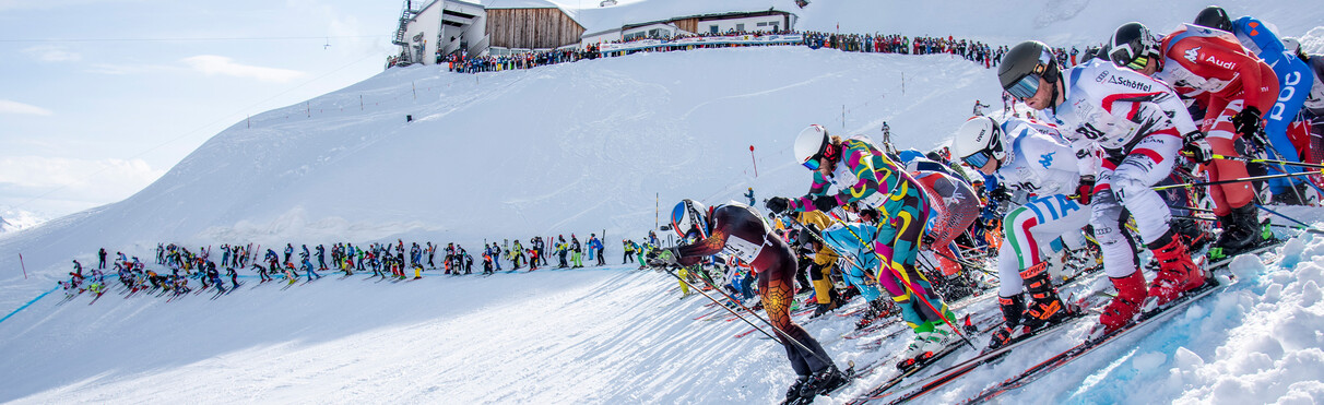 Mass start at the ski race "Der Weisse Rausch", about 150 skier start at the same time down a steep hill. 
