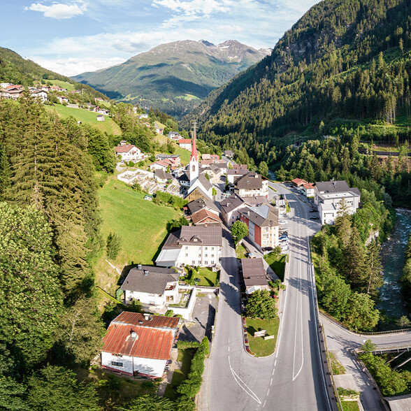View of the Boden district near Strengen with the iconic church in alpine scenery.