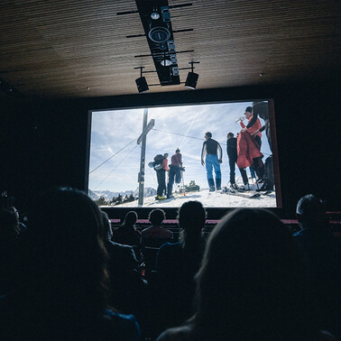 Film festival stage with presentation of a winter sports film