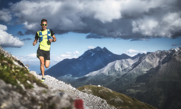 Trail runner on a hiking trail in St. Anton am Arlberg