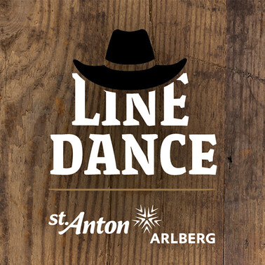 ‘Line Dance’ lettering and the St. Anton am Arlberg logo in white on a wooden background. A cowboy hat can be seen.