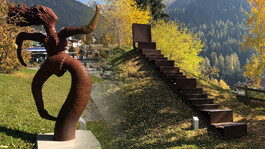 Two contemporary outdoor sculptures in an autumn landscape – a dynamic metal figure on the left and a symbolic stairway into the void on the right.