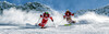 Zwei Skifahrer auf der Piste